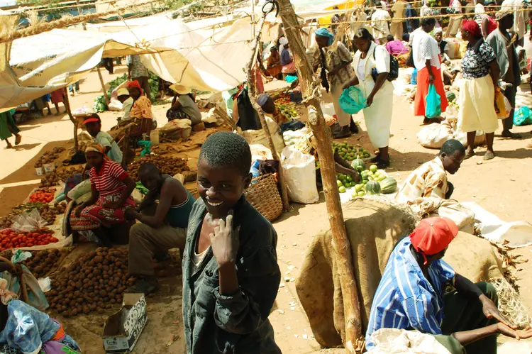 Tharaka people buying and selling in the market